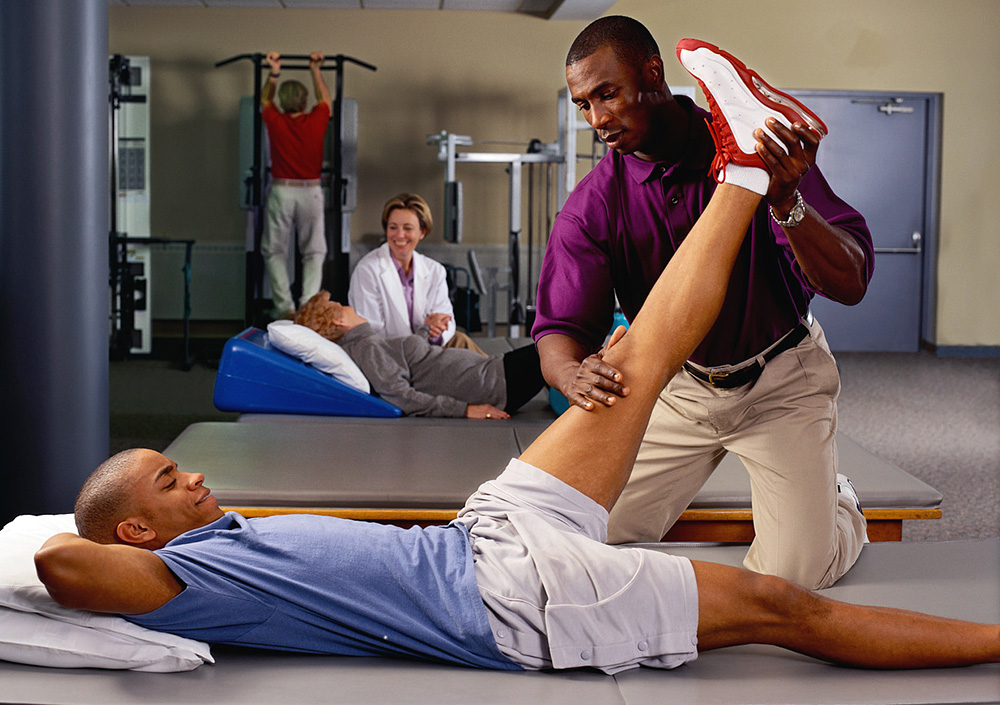 Physical Therapist Working with Patient